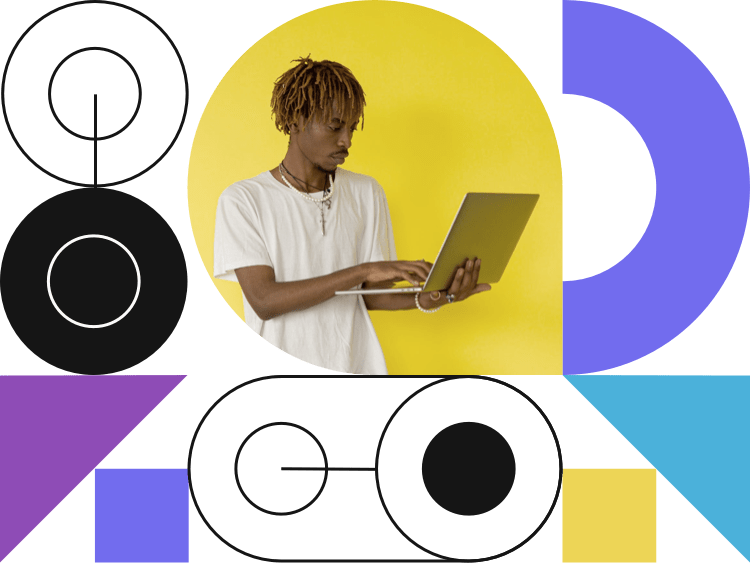 A picture of a person working with a laptop and some shapes